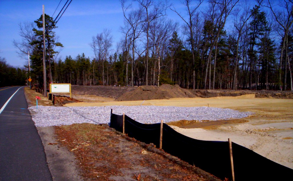 Proper erosion control practices such as the silt fence and stone pad displayed here will help prevent the process of erosion and harmful stormwater runoff from affecting the local environment.