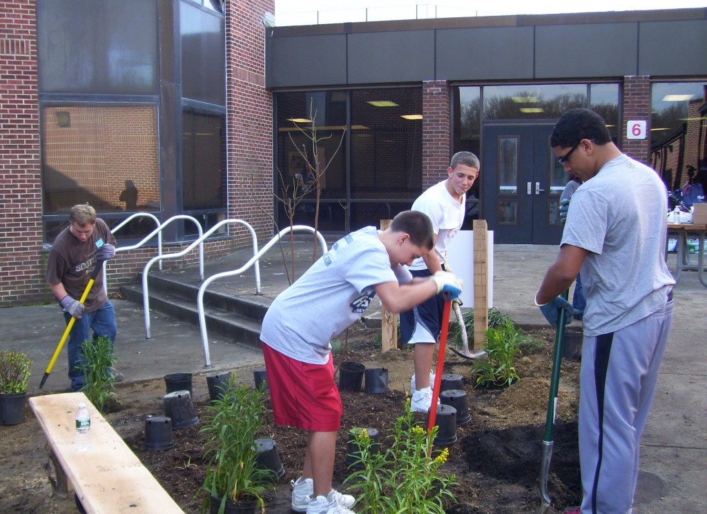 Students planting an outdoor classroom